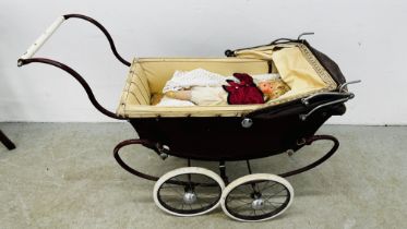 A VINTAGE COACH BUILT DOLL'S PRAM AND DOLL.