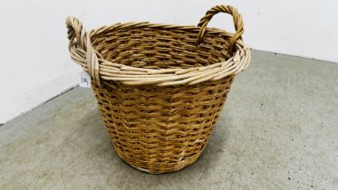 A QUALITY HANDCRAFTED TWO HANDLED WICKER BASKET, DIAMETER 60CM X HEIGHT 54CM (INCLUDING HANDLE).
