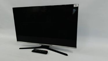 A SAMSUNG 32 INCH TELEVISION SET WITH REMOTE CONTROL, STAND A/F - SOLD AS SEEN.