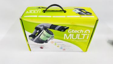 A G-TECH MULTI HIGH PERFORMANCE CORDLESS HAND HELD VACUUM AND ACCESSORIES (NO CHARGER) - SOLD AS