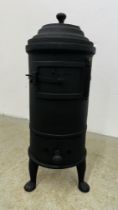 AN ANTIQUE NO.83 WOOD / COAL STOVE HEIGHT 66CM ON 3 PAW FEET.