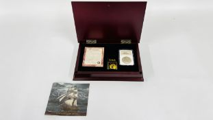 EL CAZADOR SHIPWRECK 8 REALES SILVER COIN IN PRESENTATION BOX WITH CERTIFICATE OF AUTHENTICITY.