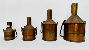 A SET OF FOUR CYLINDRICAL BRASS AND COPPER LIQUID WORKING CAPACITY MEASURES ENGRAVED