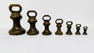 SEVEN VICTORIAN GRADUATED BELL WEIGHTS ENGRAVED COUNTY OF NORTHAMPTON - 56lb, 28lb, 14lb, 7lb, 4lb,