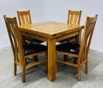 A MODERN OAK EXTENDING DINING TABLE + A SET OF MATCHING DINING CHAIRS,