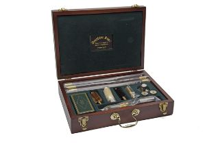 PENDLETON ROYAL A LUXURY 'WINDSOR' 12-BORE GUN CLEANING KIT, with a green baize-lined tray