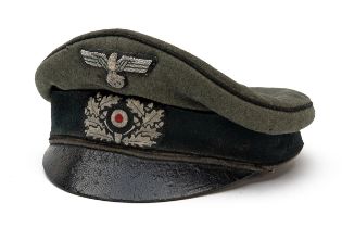 A GERMAN WORLD WAR TWO OLD STYLE FELDMUTZE 'CRUSHER' PEAKED CAP, in field grey-green with dark green