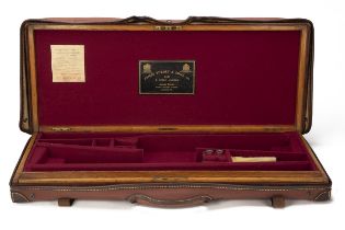 JAMES PURDEY & SONS LTD A BRASS-CORNERED OAK AND LEATHER DOUBLE GUNCASE WITH CANVAS AND LEATHER