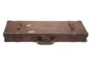 JAMES MACNAUGHTON & SONS A BRASS-CORNERED LEATHER DOUBLE GUNCASE, fitted for 28in. barrels, red