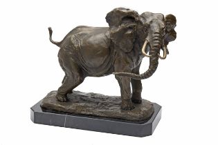 A BRONZE SCULPTURE OF AN AFRICAN BULL ELEPHANT, mounted on a marble plinth, measuring approx.