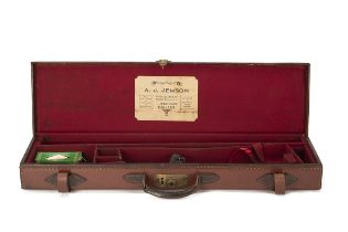 A.J. JEWSON A LEATHER SINGLE GUNCASE, fitted for 28in. barrels, the interior lined with maroon