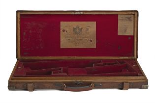 HOLLAND & HOLLAND A BRASS-CORNERED OAK AND LEATHER DOUBLE GUNCASE, fitted for 30in. barrels, the