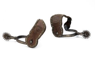 A RARE 'ROCKY MOUNTAIN' PAIR OF RIDING SPURS WITH STRAPS MARKED 'EATONS' RANCH' WOLF WYOMING,
