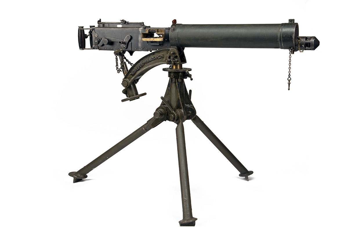 A DEACTIVATED .303 VICKERS MEDIUM MACHINE GUN WITH TRANSIT CHEST AND TRIPOD, serial no. H5131, circa