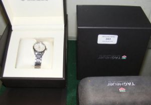 A ladies Tag Heuer wrist watch with date aperture,