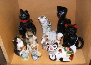 Assorted cat ornaments, including Winstanley and