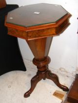 A Victorian octagonal needlework table with fitted