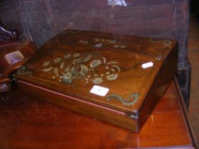 A Victorian rosewood writing slope with mother of