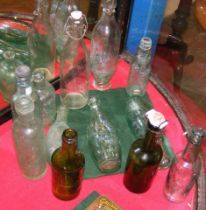 Twelve assorted vintage bottles, including a Schwe