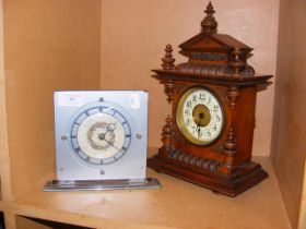 An antique German walnut mantel clock, together wi
