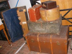 Two vintage travelling trunks, three travelling ca