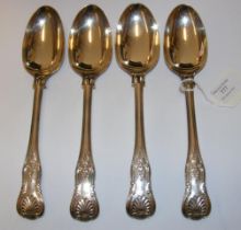 A set of four silver serving spoons with Kings Pat