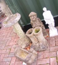 Assorted garden statues, including birdbath