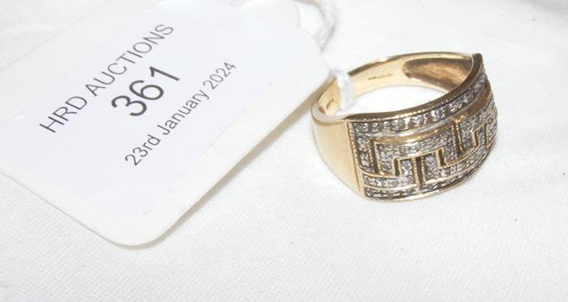 A 9ct dress ring set with diamonds