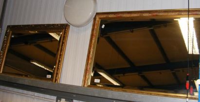 Two bevelled wall mirrors