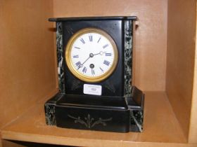 A Victorian slate and marble mantel clock