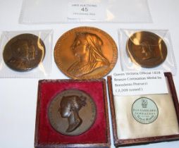 Four Queen Victoria commemorative medallions inclu