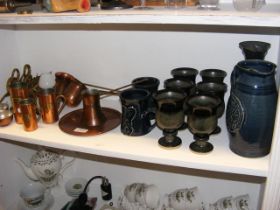 A medley of brass and copper metal ware and studio