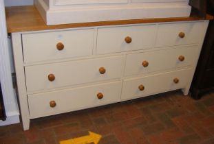 A cream and pine sideboard - consisting of three s