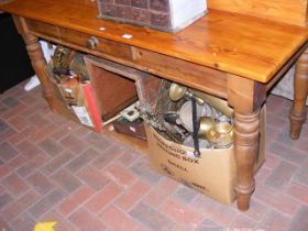 A lacquered pine farmhouse kitchen table on turned