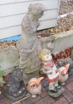 Assorted garden statues, including partially robed