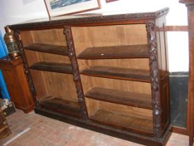 A Victorian carved oak open bookshelf - 180cm wide