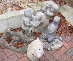 Assorted garden statues, including otter and dolph