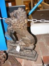 A cast iron door stop of lion