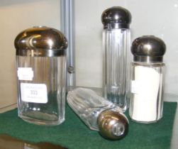 Silver topped scent bottles