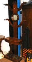 A Victorian mahogany hall stand with circular mirrored back
