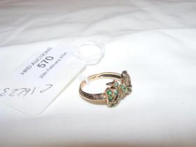 A 9ct emerald mounted ring - approx. size N