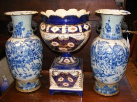 A pair of antique Oriental vases, together with a