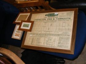An assortment of framed vintage railway timetables