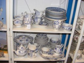 Blue and white tea and dinnerware (contained on tw