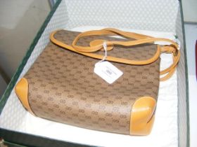 A boxed Gucci ladies handbag