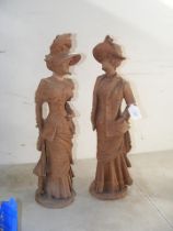 A pair of antique terracotta figures of Victorian