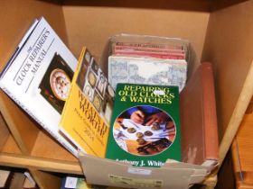 Selection of books, including 'The Clock Repairer'