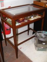 A mahogany display cabinet