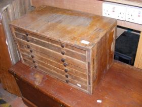 A seven drawer wooden tool chest