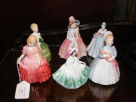 A Royal Doulton figurine, together with five other